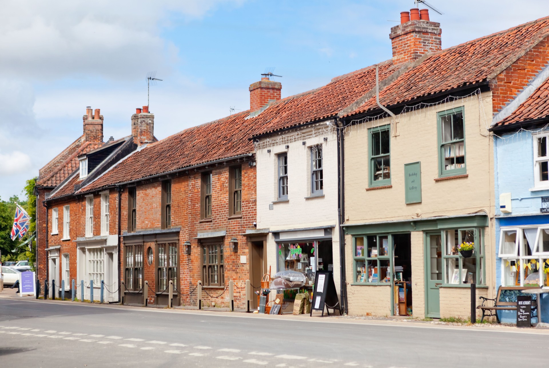 Shops in Market Place on The Green, in popular Burnham Market Village, North Norfolk, UK